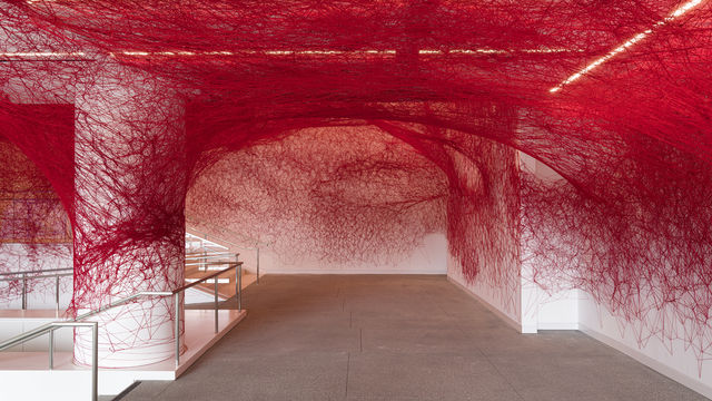 Web of red twine wraps Hammer Museums entire walkway