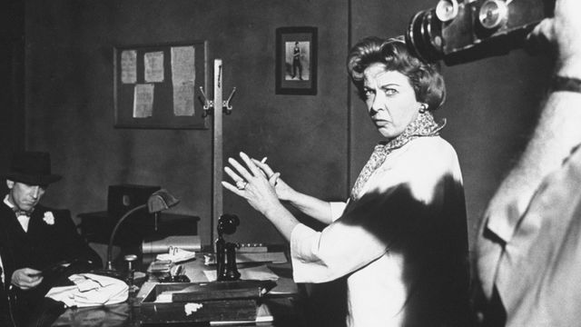 Lupino directing in black and white image