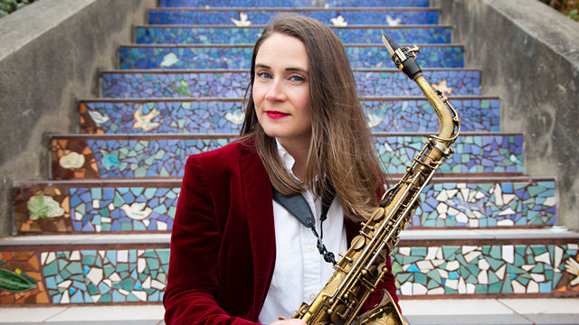 Beth Schenck holding a saxophine