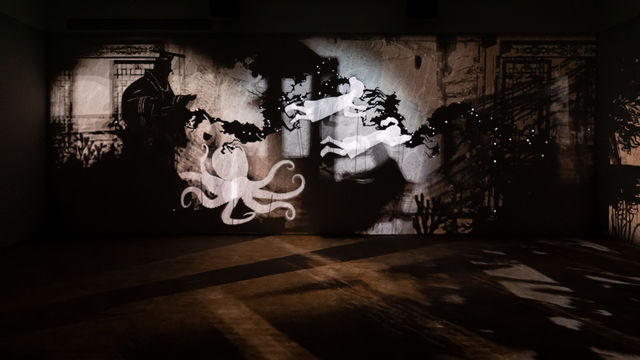 Image of multimedia installation with elements of shadow puppetry