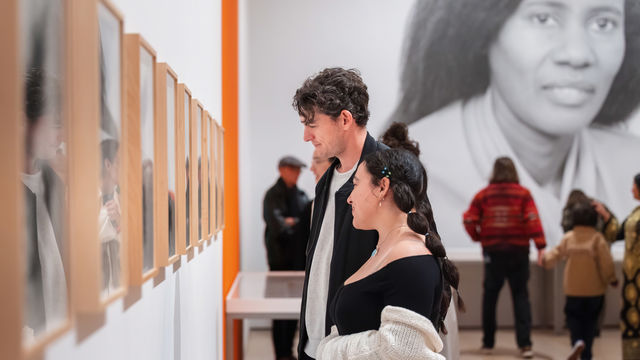 Museumgoers looking at art