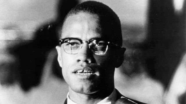 Black and white image of Malcolm X