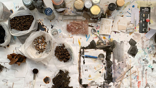 Overhead view of art materials on a table