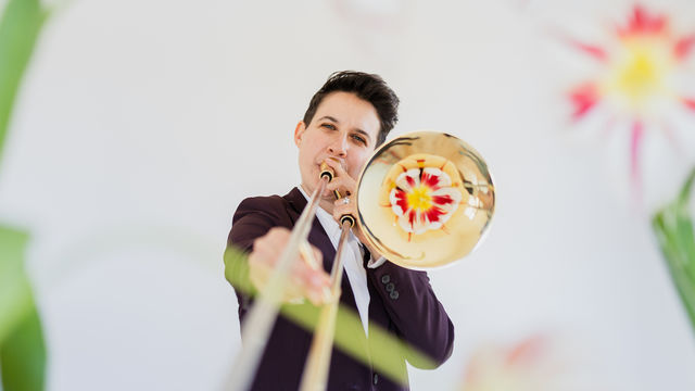 Naomi Moon Siegel plays the trombone