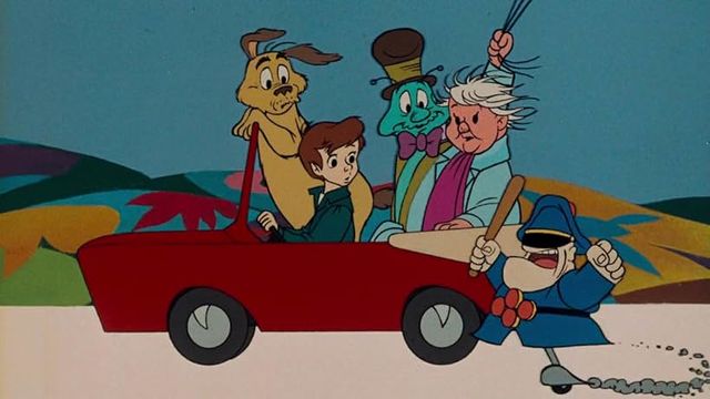 boy and his animal friends in car, against colorful backdrop. still of the phantom tollbooth.