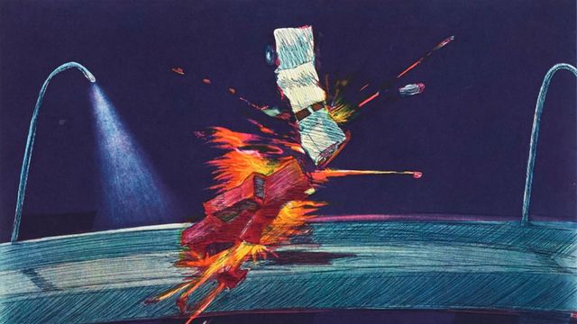 Two cars in a fiery collision on a bridge lit by streetlamps