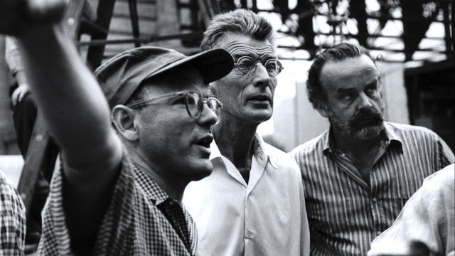 black and white still of 3 men standing