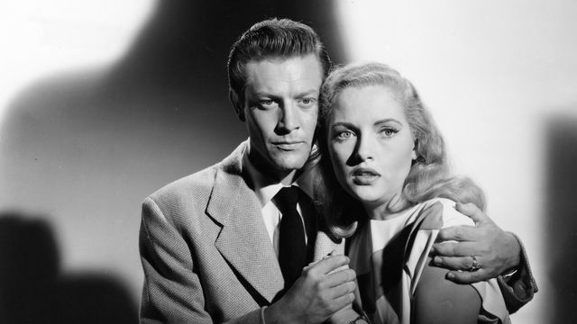 A man and a woman embrace