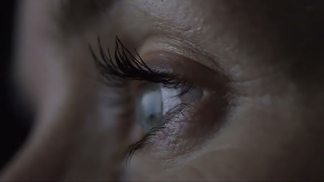 A woman's eye seen in extreme closeup