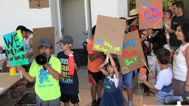 Kids with their protest signs