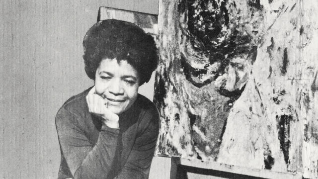 Photograph of Samella Lewis from announcement for Samella Lewis and George Clack exhibition at Brockman Gallery, Los Angeles, 1969