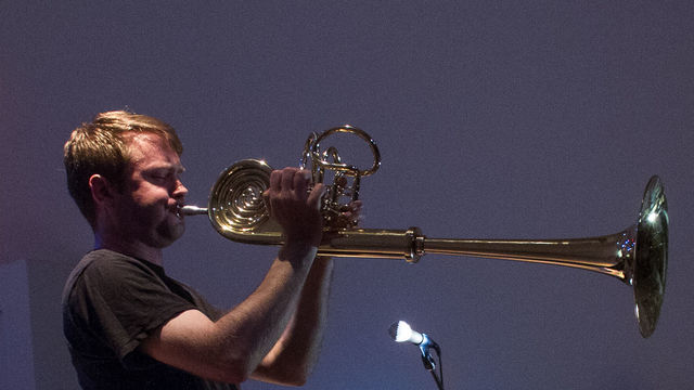 Auri-horn, 2014, Polished brass with 5 resin inserts, 40 x 12 x 9 in. Photo: Jesse Untracht-Oakner.