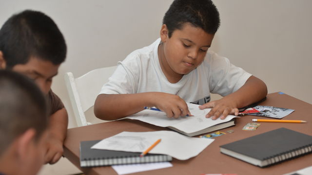 Boy writing