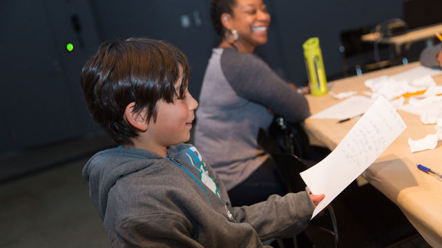 Kid at poetry workshop