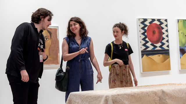 Visitors interacting in the gallery. 