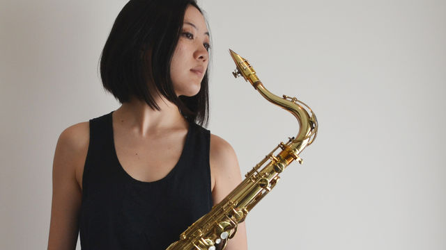 Hitomi Oba photograph, with brass instrument