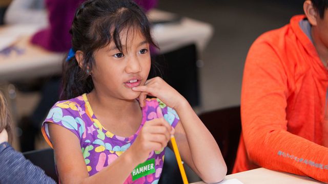 A child participating at an 826LA workshop at the Hammer