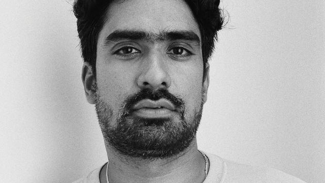 Black and white head shot of Vishal Jugdeo