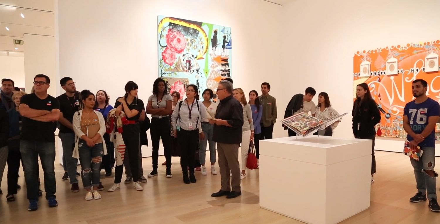 A group of people in a gallery