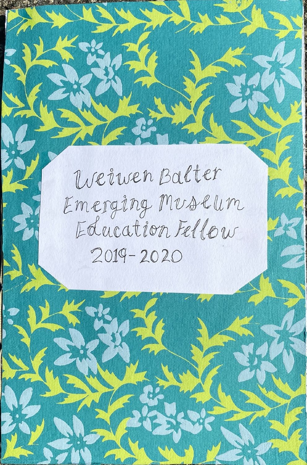 The cover of Weiwen's journal, reading 'Weiwen Balter, Emerging Museum Education Fellow, 2019-2020'