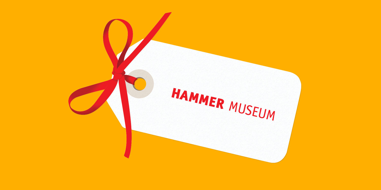 A white gift tag reading HAMMER MUSEUM on a yellow background