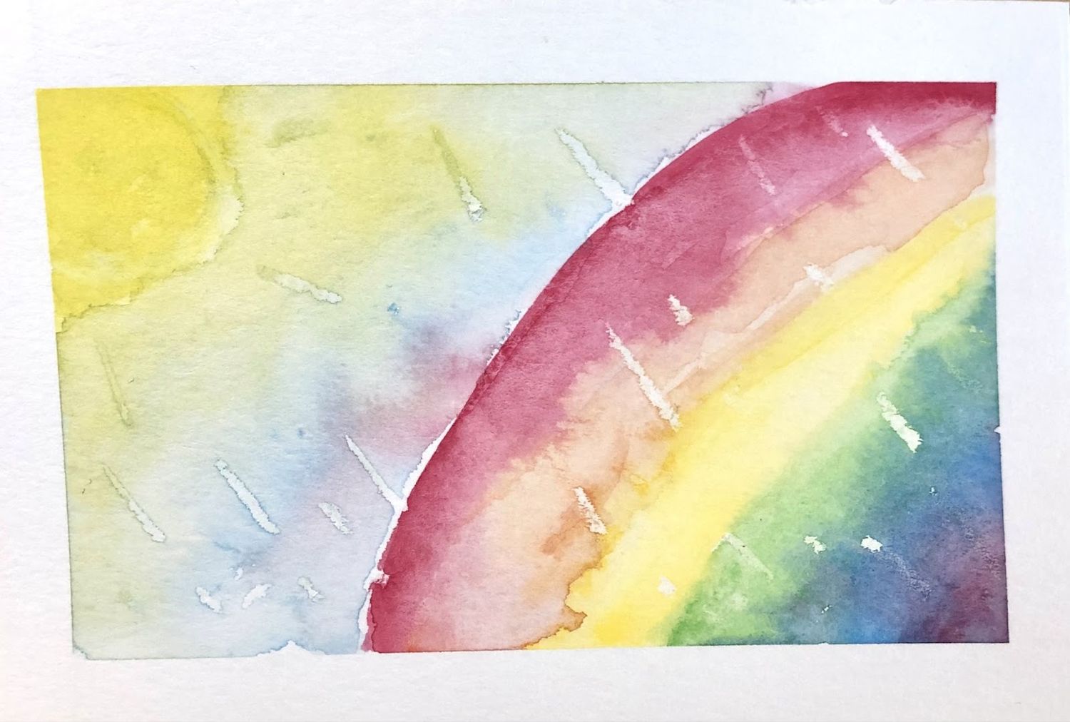 Rectangular watercolor painting with yellow sun in upper left hand corner and rainbow in lower right hand corner, white rain drops across image.