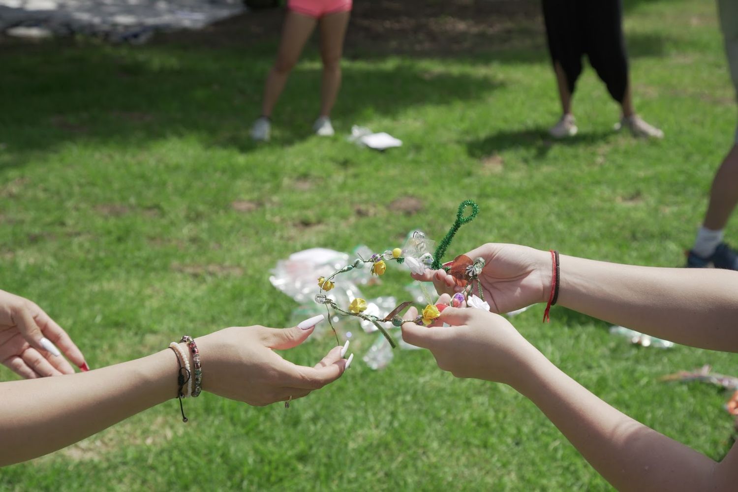 Participants pass along a handmade crown