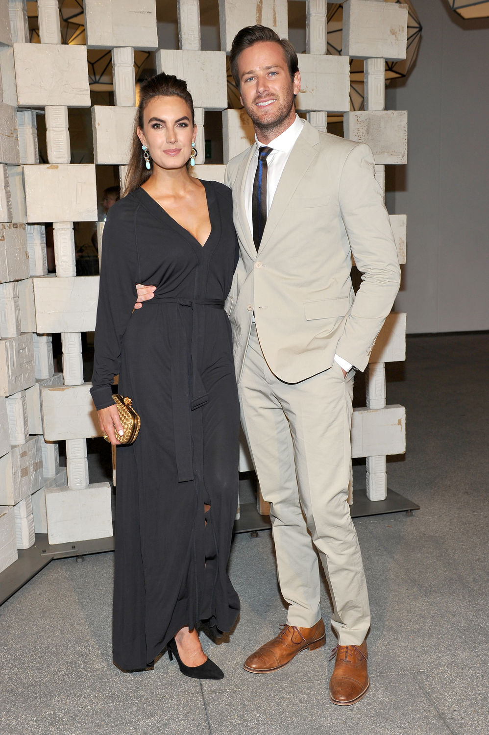 Actors Elizabeth Chambers (L) and Armie Hammer, both wearing Bottega Veneta, attend the Hammer Museum Gala in Garden sponsored by Bottega Veneta at Hammer Museum on October 10, 2015 in Westwood, California. (Photo by Donato Sardella/Getty Images for Hammer Museum)
