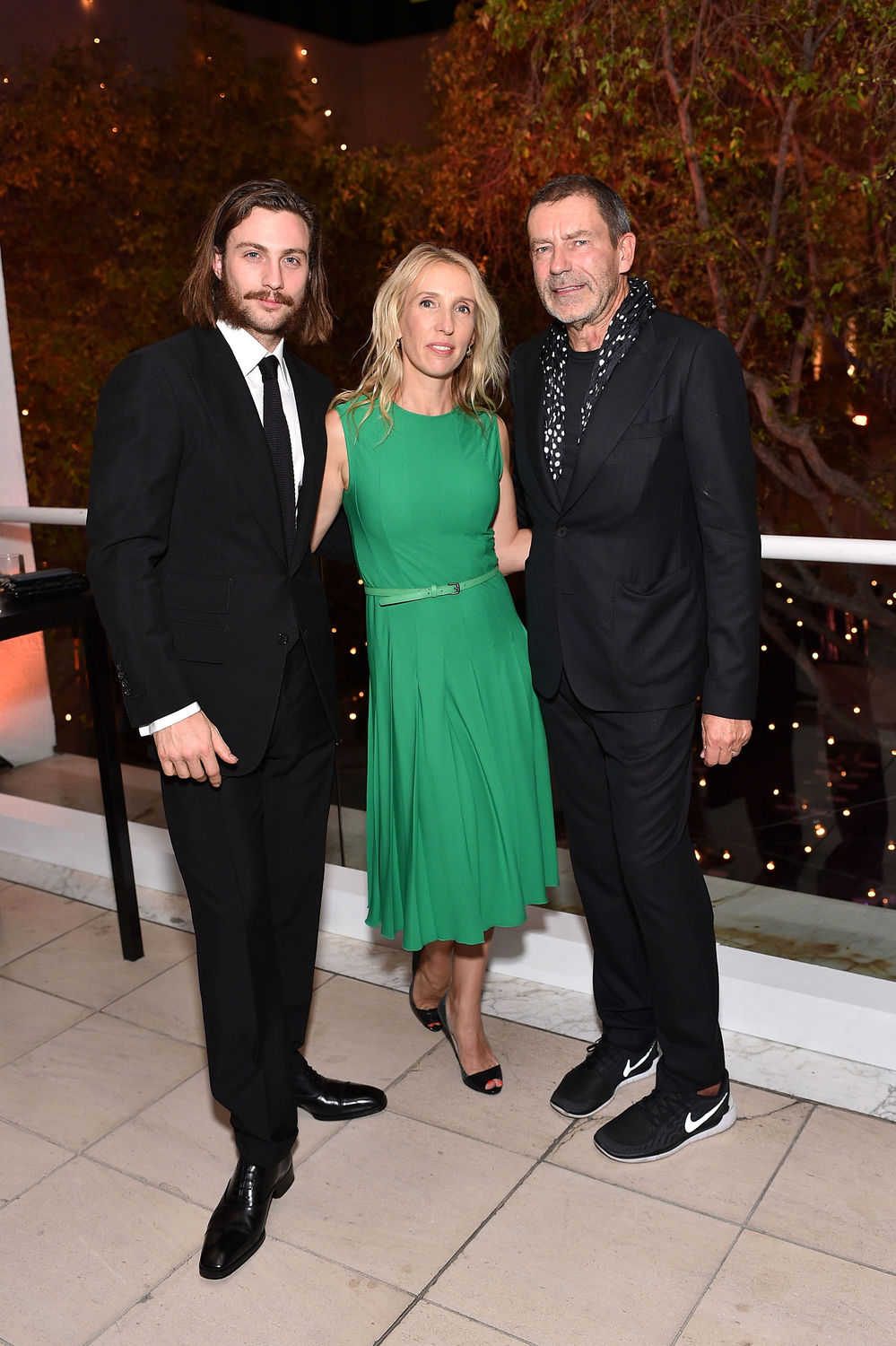 (L-R) Aaron Taylor-Johnson, Sam Taylor-Johnson and Creative Director of Bottega Veneta, Tomas Maier attend Hammer Museum's "Gala in the Garden" Sponsored by Bottega Veneta at Hammer Museum on October 10, 2015 in Westwood, California. (Photo by Stefanie Keenan/Getty Images for Hammer Museum)