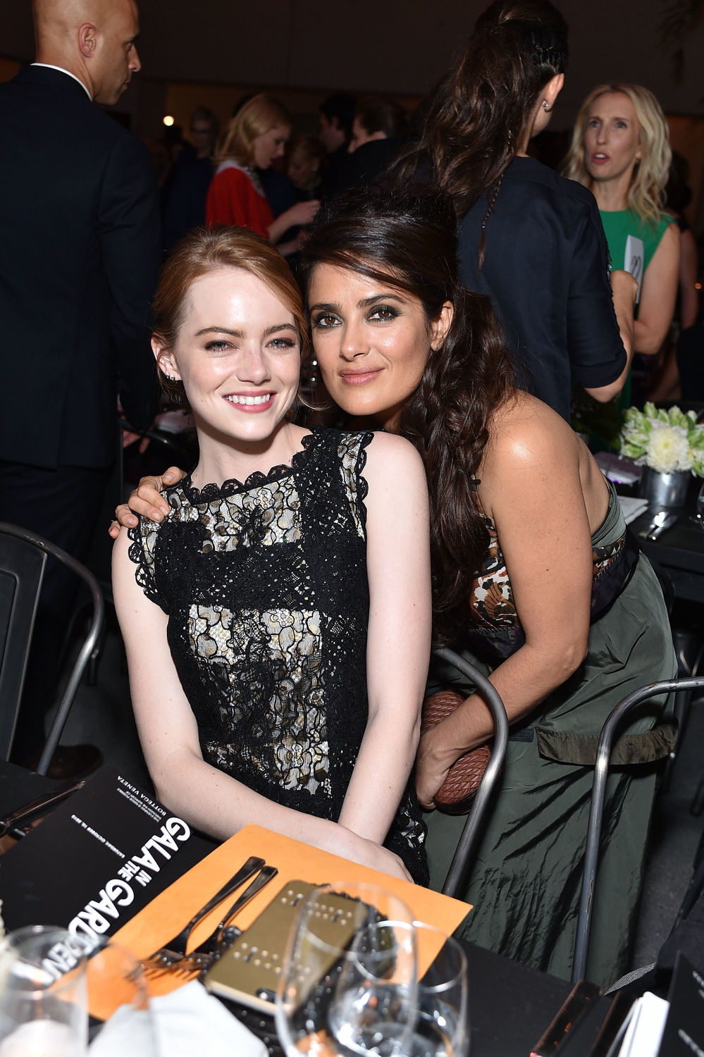 Emma Stone and Salma Hayek Pinault, both wearing Bottega Veneta, attend Hammer Museum's "Gala in the Garden" Sponsored by Bottega Veneta at Hammer Museum on October 10, 2015 in Westwood, California. (Photo by Stefanie Keenan/Getty Images for Hammer Museum)