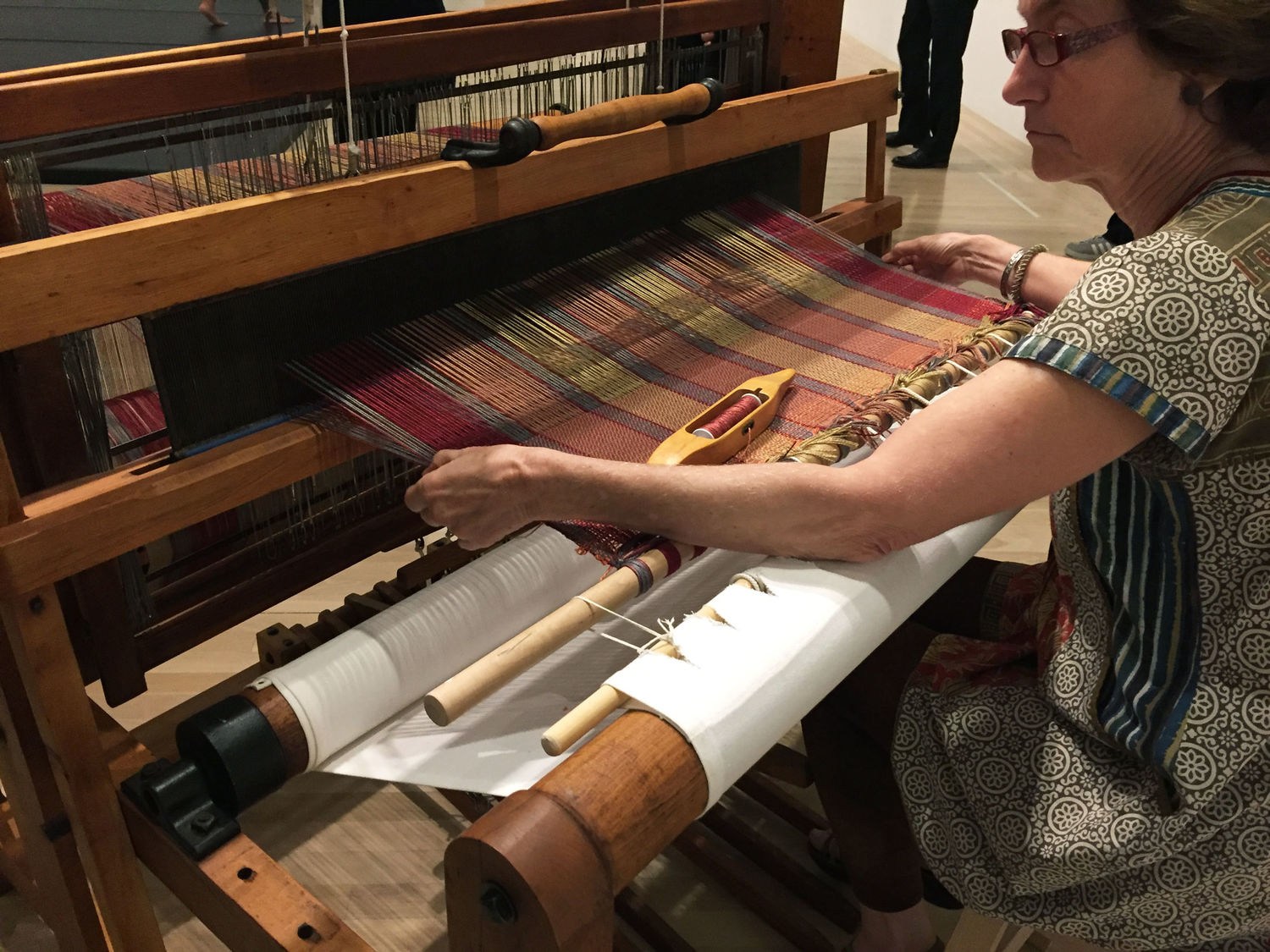 Professional weaver Cameron Taylor-Brown demonstrated the process of loom weaving using Anni Albers's Shuttle-Craft Practical Loom