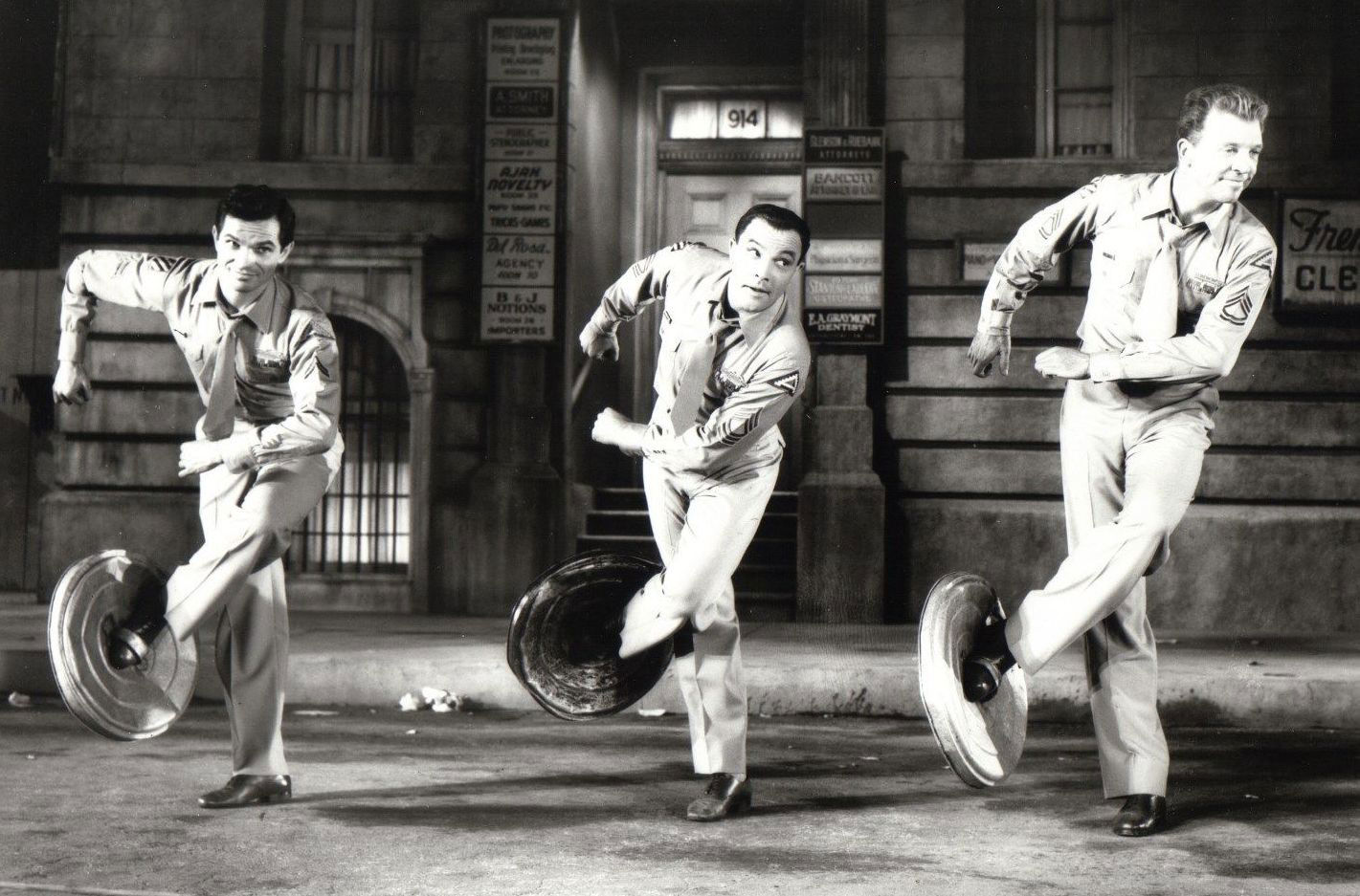Publicity photo for "It's Always Fair Weather" (1955), showing Michael Kidd, Gene Kelly and Dan Dailey