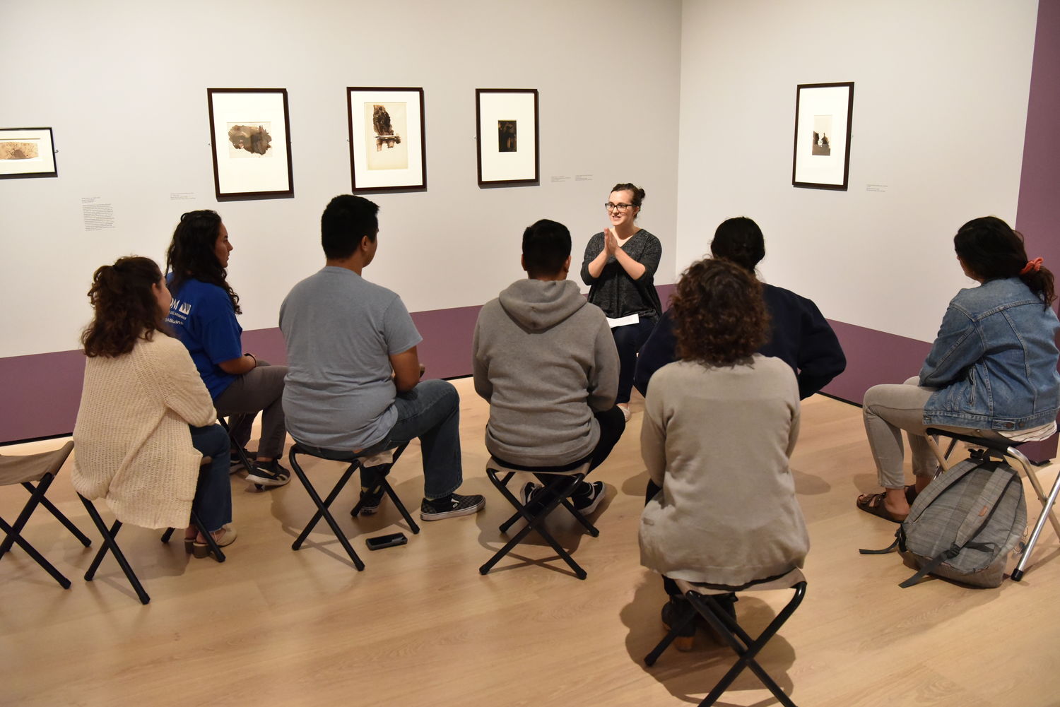 Educator Zoe Silverman leads UCLA students in mindful meditation with drawings by Victor Hugo.