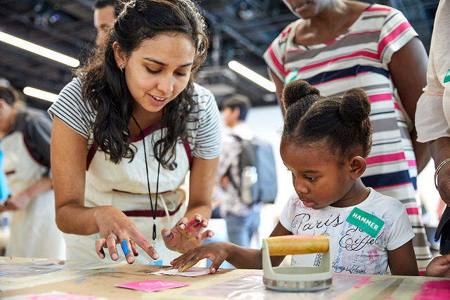 Families created prints celebrating their neighborhoods in a workshop conceived by artist Olga Koumoundouros at Family Day: Kids for Peace. 