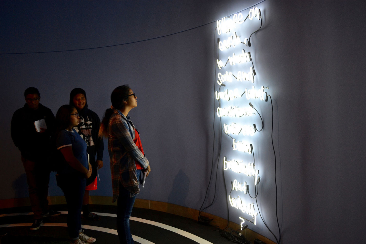 Students in EJ Hill's gallery