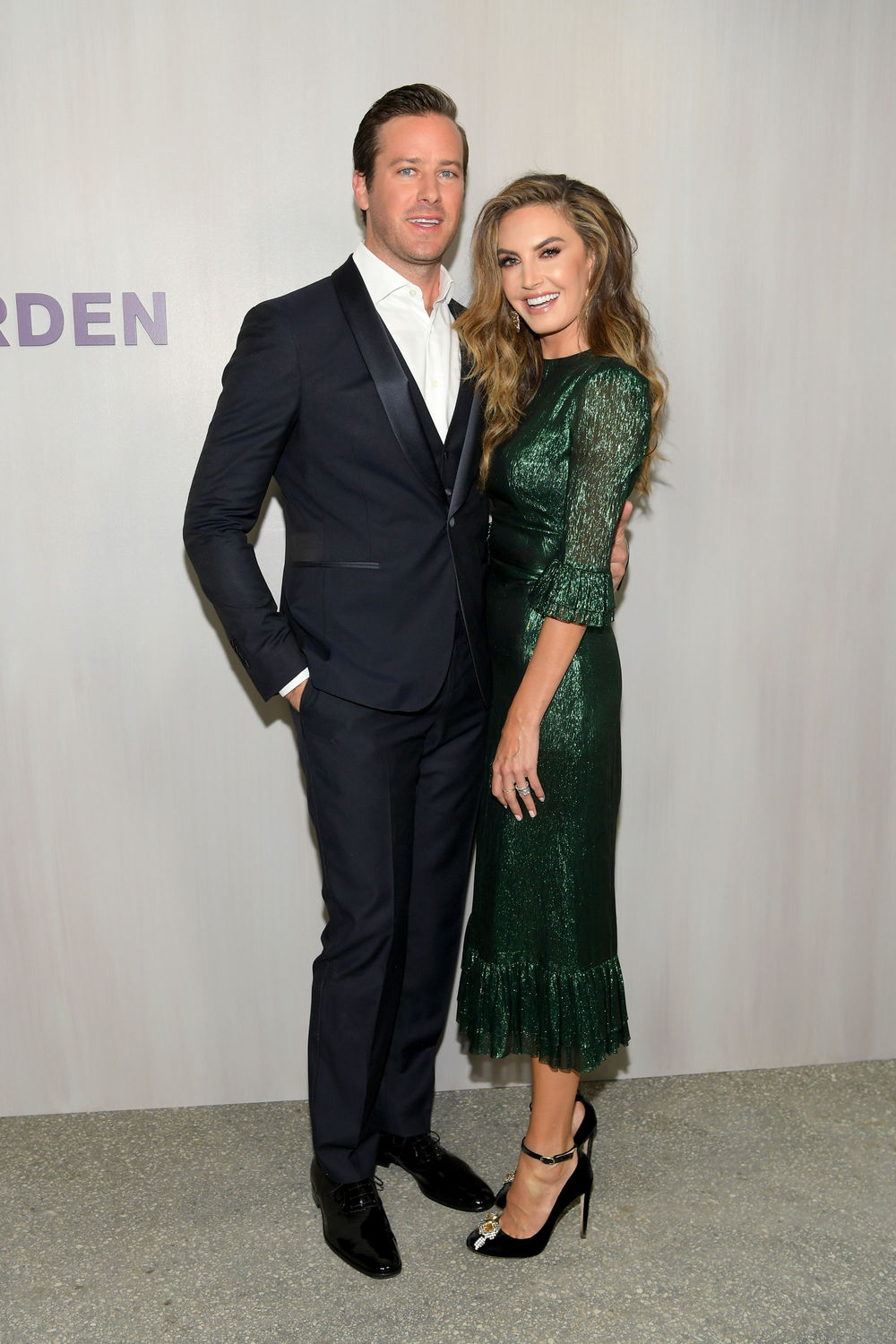 Armie Hammer (L), wearing Ferragamo, and Elizabeth Chambers, wearing The Vampire's Wife at The Webster, attend the Hammer Museum 16th Annual Gala in the Garden with generous support from South Coast Plaza at the Hammer Museum on October 14, 2018 in Los Angeles, California. (Photo by Emma McIntyre/Getty Images for Hammer Museum)