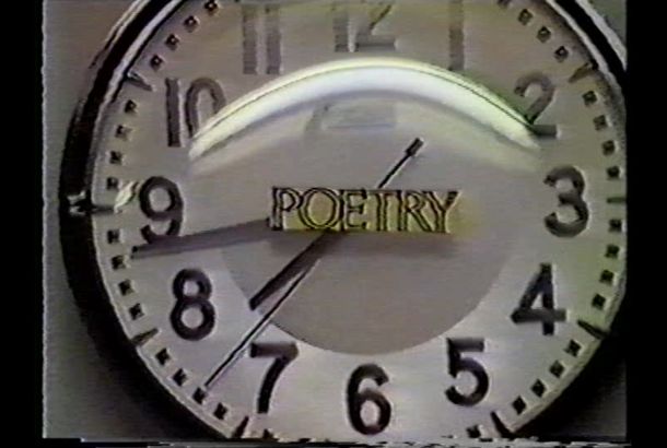 A film still of a clock with the word 'poetry' over its face