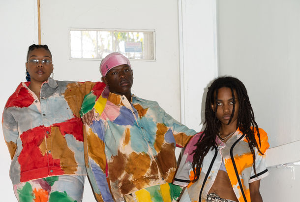 Four models pose in colorful tops and bottoms