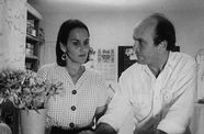 Still from the film The Whole Shootin' Match (1978) showing a man and a woman looking at each other with concern