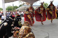 Dancers in animal costumes perform a sacred Mayan Deer Dance