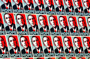 A wall covered in posters for President Obama