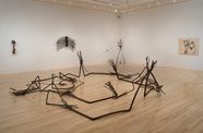 A wire rope sculpture on a gallery floor