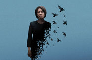 Photograph of a woman in a black dress against a blue background, where the woman's dress dissolves into birds o the right side. 