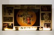 A lightboard covered in collage