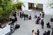 People walking around the Hammer Courtyard