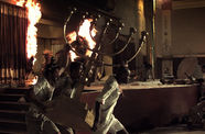 Men carry giant menorah through burning building