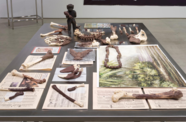 Art pieces sit on table top