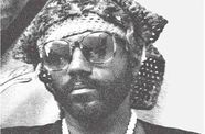 Black and white portrait of a man with sunglasses.
