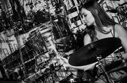 Woman playing the drums.