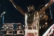 Isaac Hayes performing live in a still from the film "Wattstax" (1973)